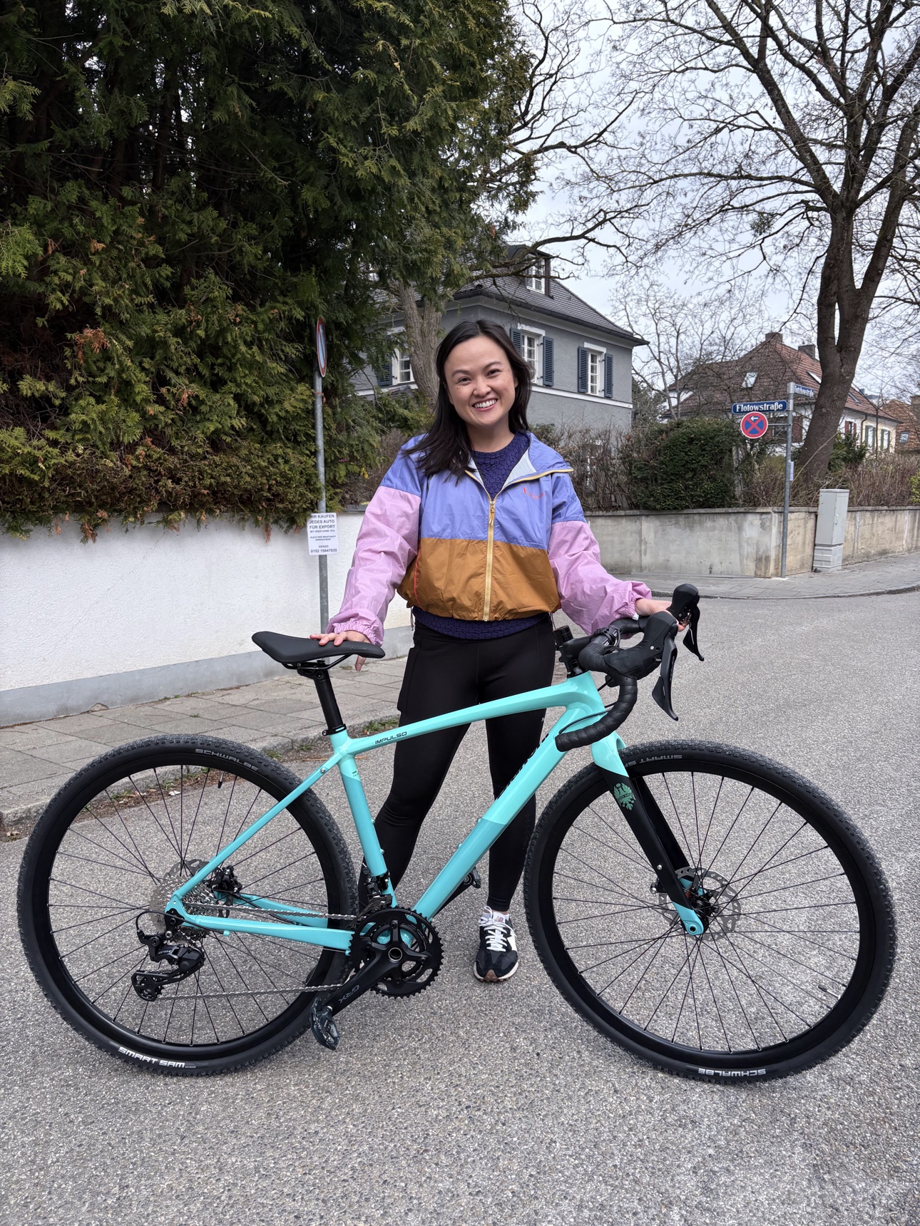 Linh with her new bike at the local bike shop.